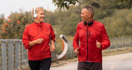 two adults on a light jog